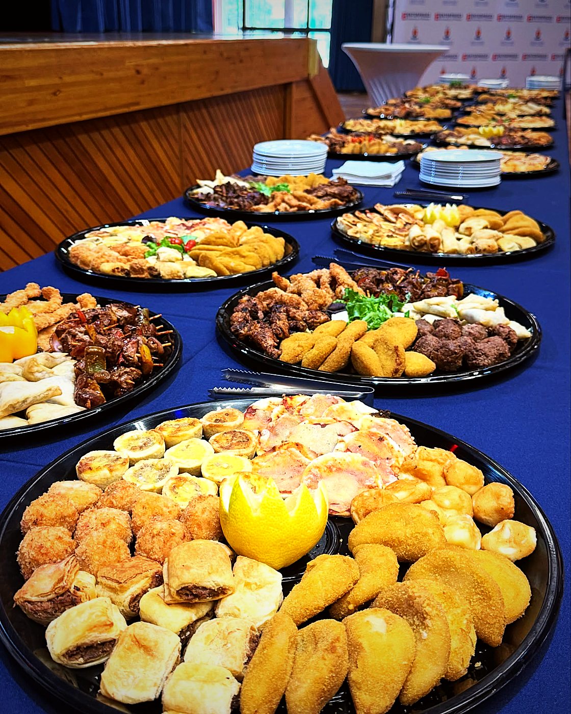 Platters of savoury pastries, samoosas and finger food at the GSTM Certificate Ceremony